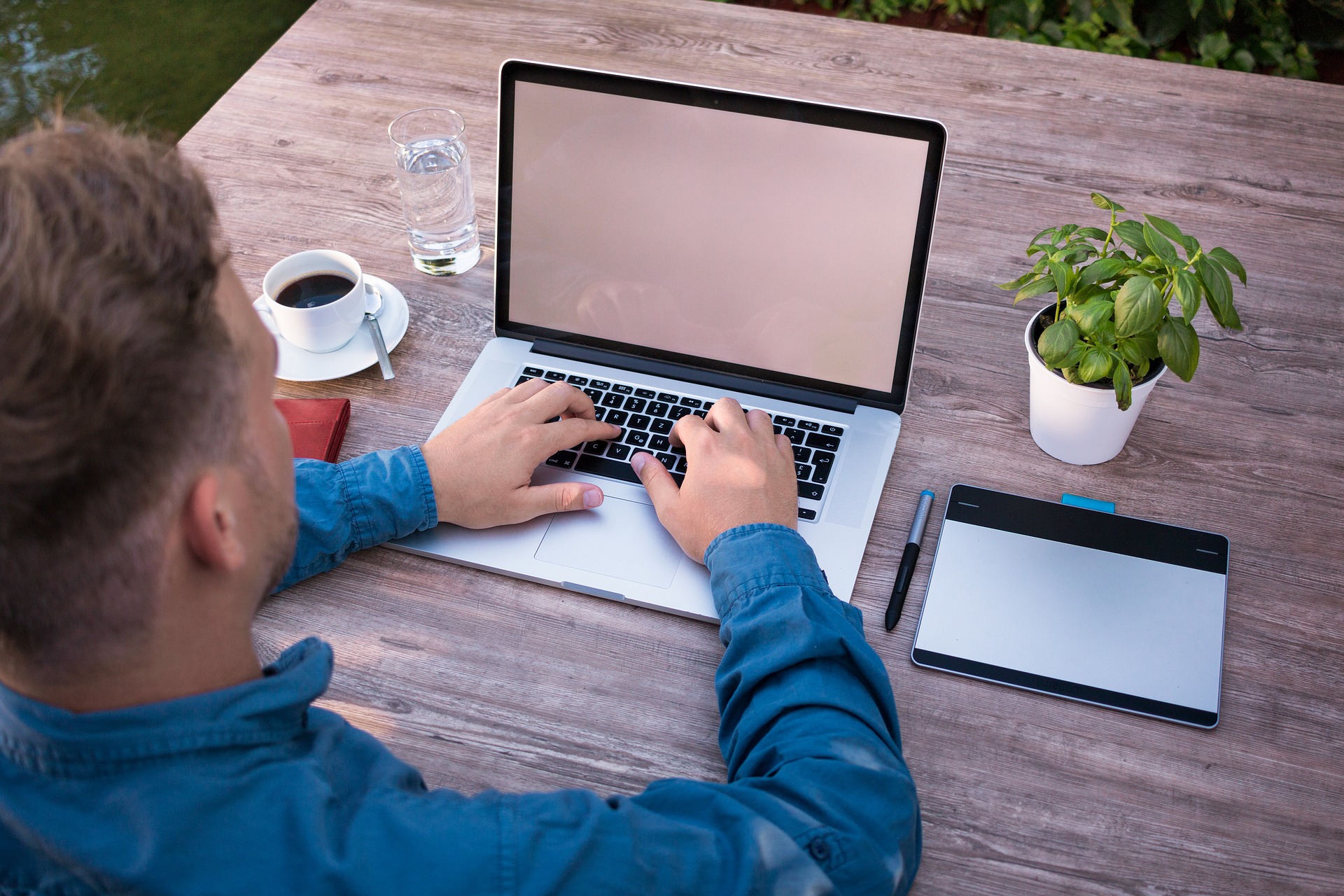 Copywriter writing on a laptop